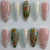 Künstlerisches florales und Edelstein Press-On Nagelset Brehn