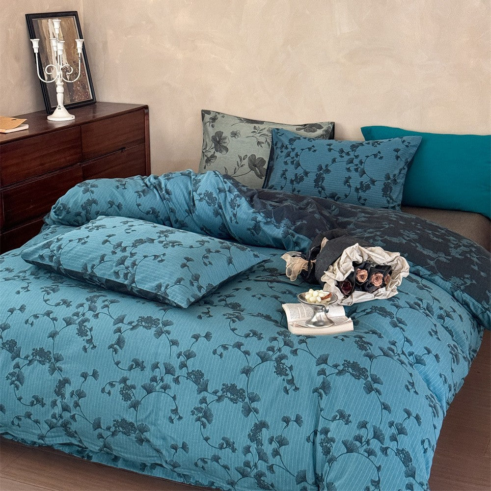 Premium-Baumwoll-Bettgarnitur mit floraler Allover‑Webstruktur und leichter Steppung