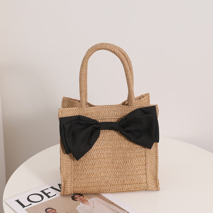 Elegante Basttasche mit Schleifendetail Brehn