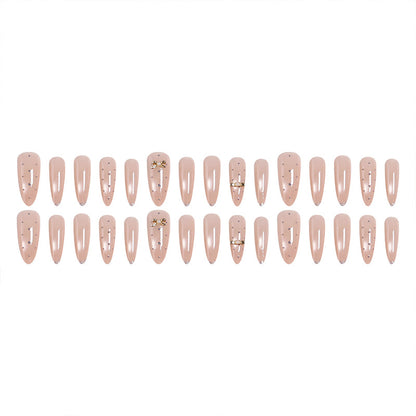 Kunstnagelset mit eleganten Schmuckdetails Brehn