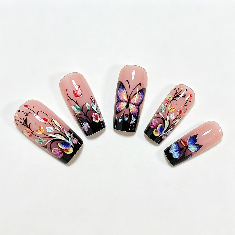 Künstlerische Blumen- und Schmetterlings-Press-On-Nagelkunst Brehn