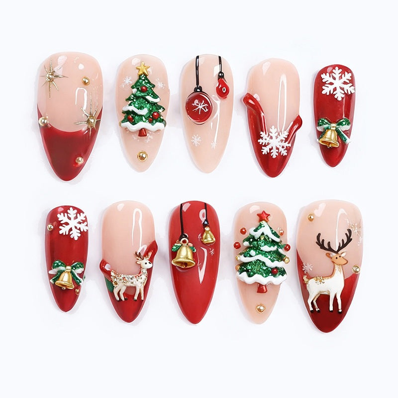 Kunstnagelset mit festlichen Motiven und Glitzerelementen Brehn