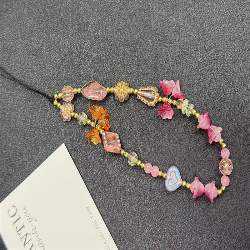 Blumenkette mit Perlen Brehn