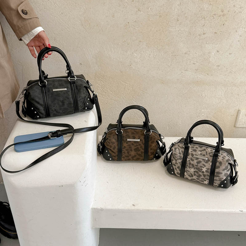 Zeitgenössische gemusterte Handtasche