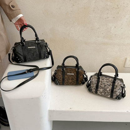 Zeitgenössische gemusterte Handtasche