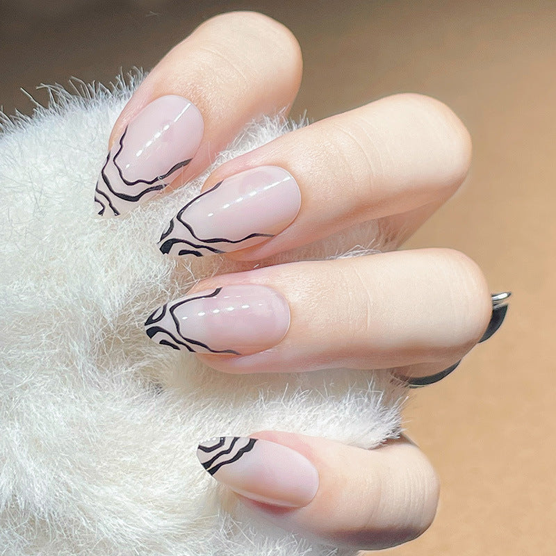 Elegantes Stiletto Press-On Nagelset mit Marmor-Details Brehn