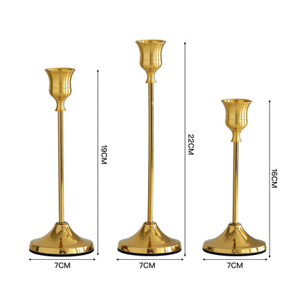 Elegante goldene Kerzenhalter Set