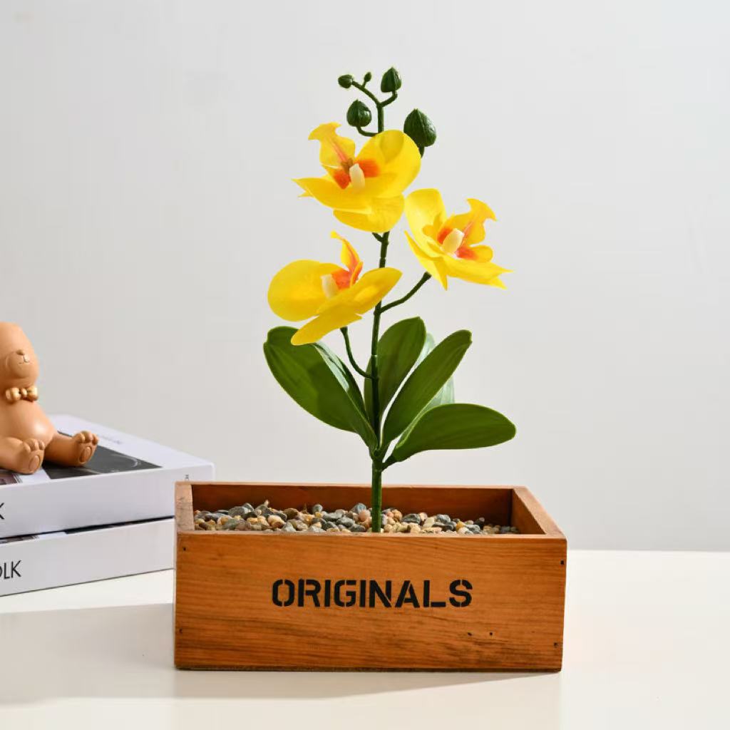 Elegante künstliche Orchideenarrangement für Tischdekoration