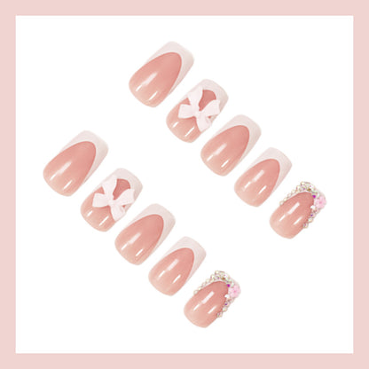Kunstnagelset mit eleganten Schleifen- und Glitzerdesigns Brehn