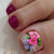 Kunstnägel mit Floralen Designs und Glitzereffekten Brehn