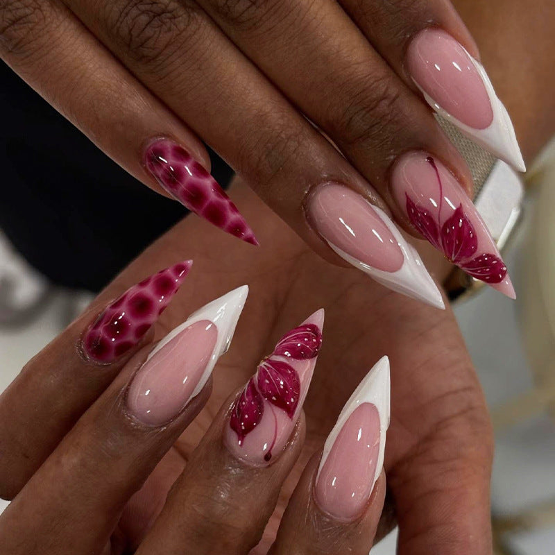 Künstlerisches Press-On-Nagelset mit dekorativen Designs Brehn