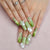 Kreatives Nagelset mit floralem Design und filigranen Akzenten Brehn