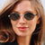 Damen runde Brille mit elegantem Metallrahmen und verstellbaren Nasenpads Brehn