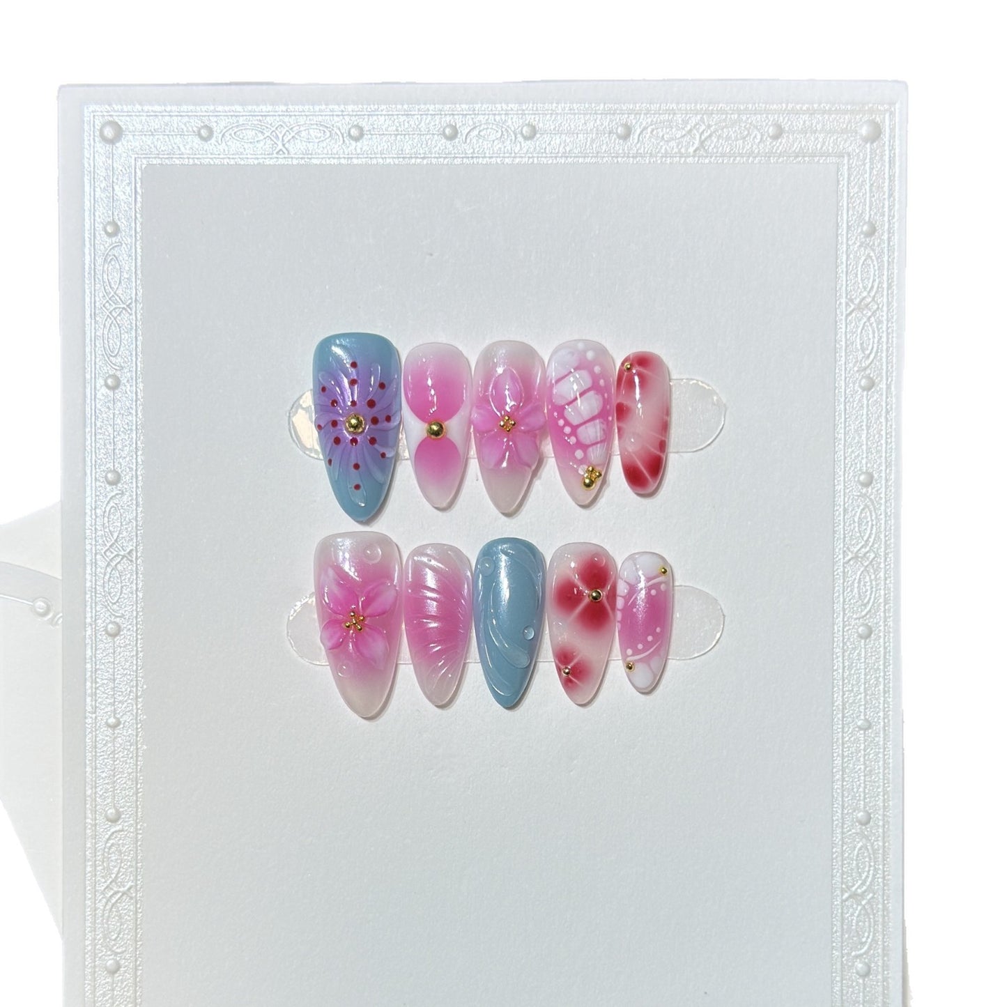 Künstlerisches Press-On-Nagelset mit floralen und abstrakten Designs Brehn