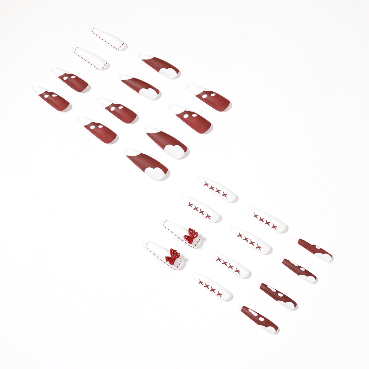 Kunstvolle Stiletto-Nägel mit Dekor und Glitzer Brehn