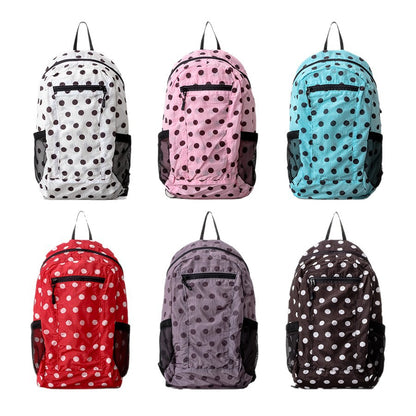 Verspielt gepunkteter Rucksack