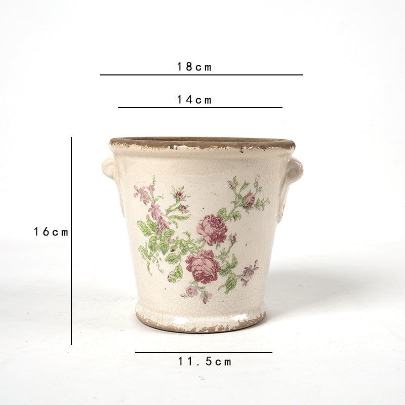 Dekorativer Blumentopf mit floralen Verzierungen Brehn