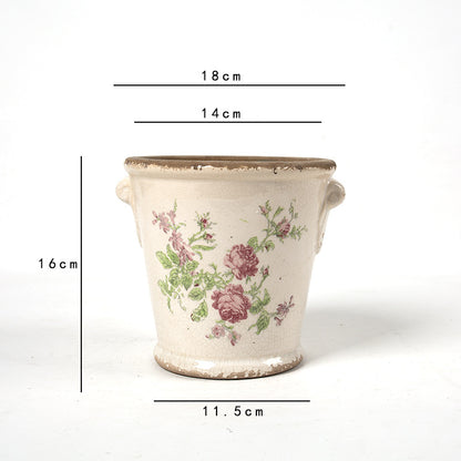 Dekorativer Blumentopf mit floralen Verzierungen Brehn