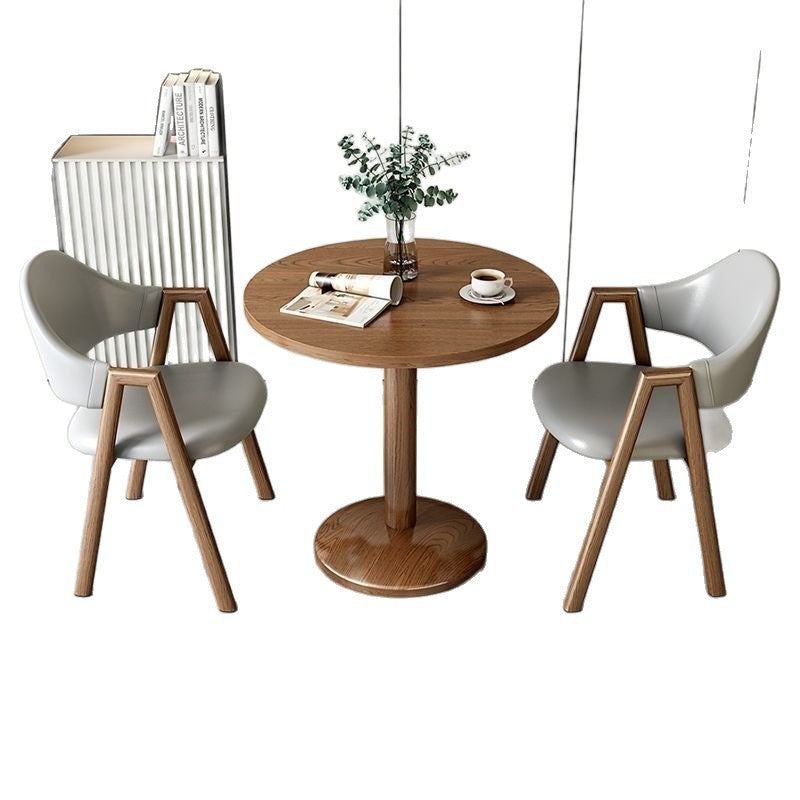 Designertisch mit Marmorplatte und stabiler Metallbasis Brehn