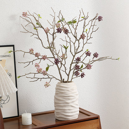 Dekorativer Kunstzweig mit detailverliebten Blüten Brehn