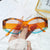 Damen modische Sonnenbrille mit markantem, futuristischem Design Brehn