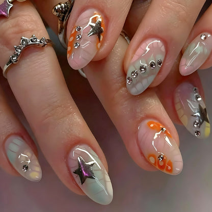 Kunstnagelset mit kreativen Designs und Glitzerakzenten Brehn