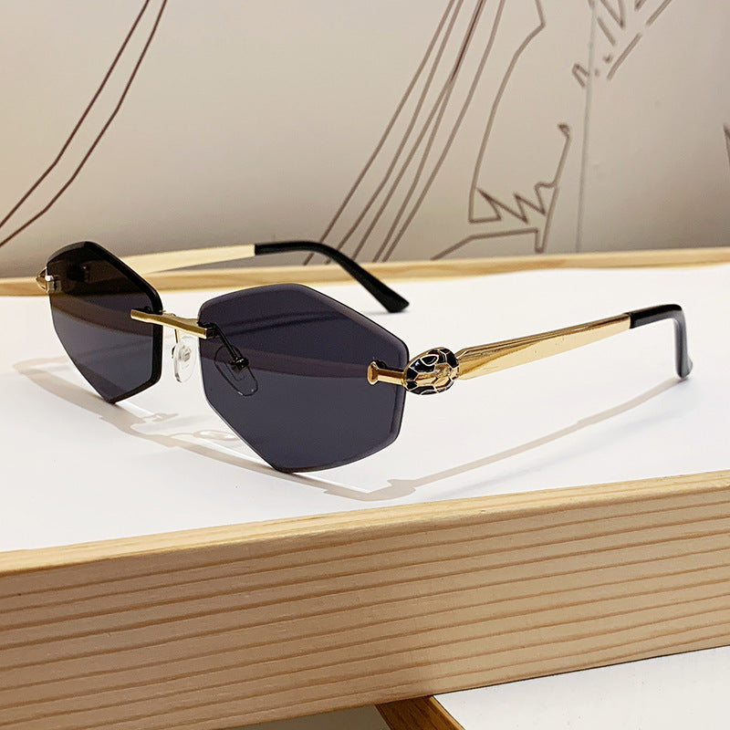 Damen Designer Sonnenbrille mit hexagonalem Rahmen und goldenen Akzenten Brehn