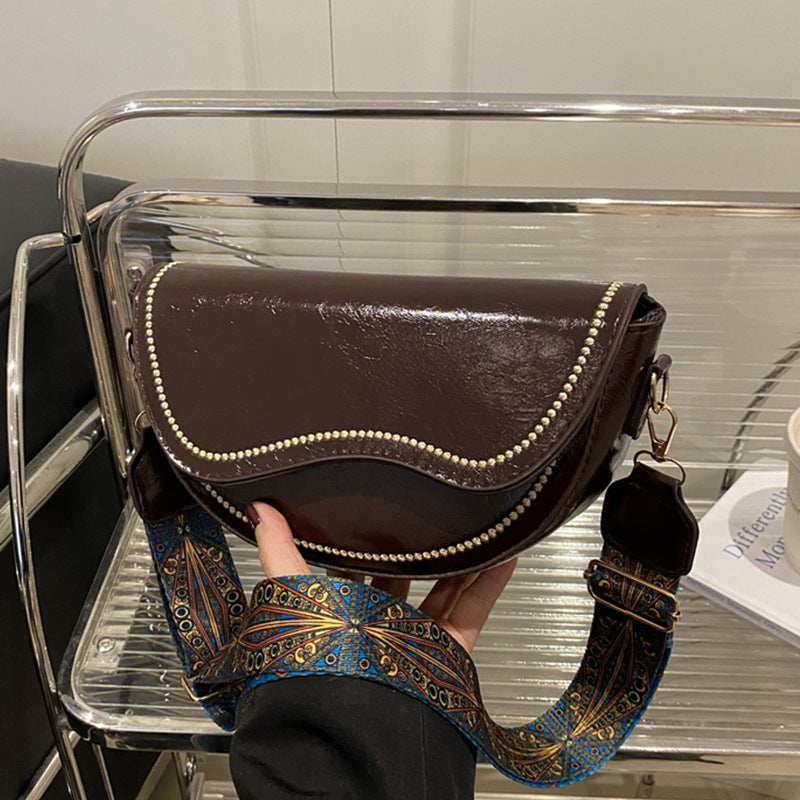 Elegante strukturierte Umhängetasche