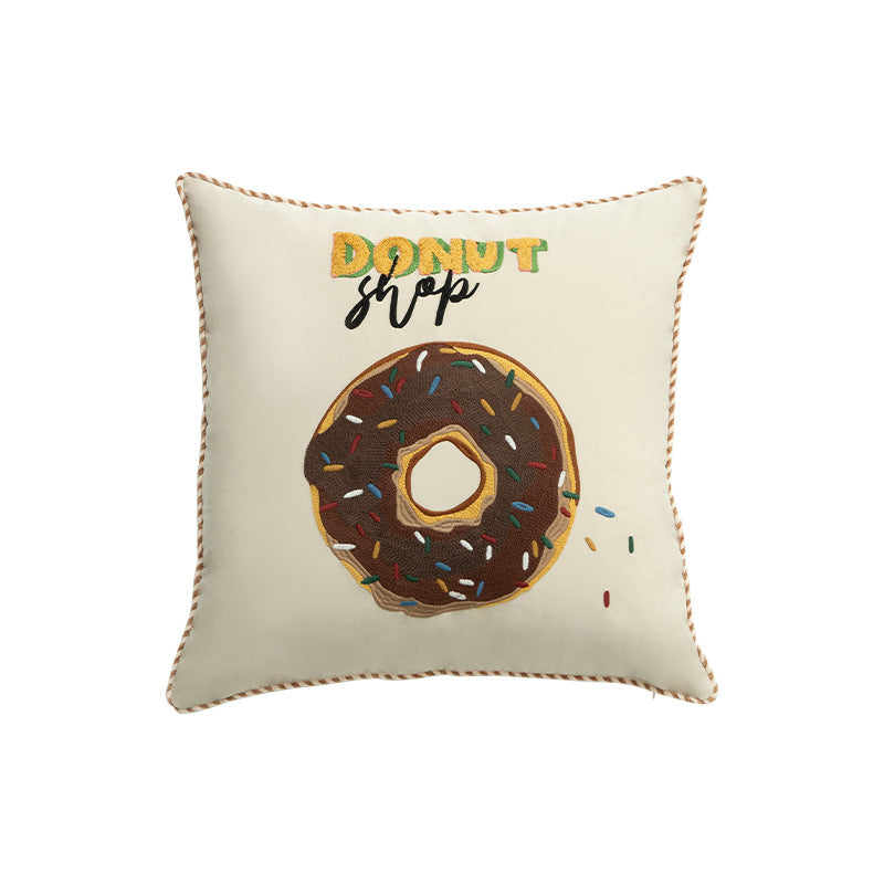 Quadratischer dekorativer Kissenbezug mit handgestickter Donut‑Applikation und Keder Brehn