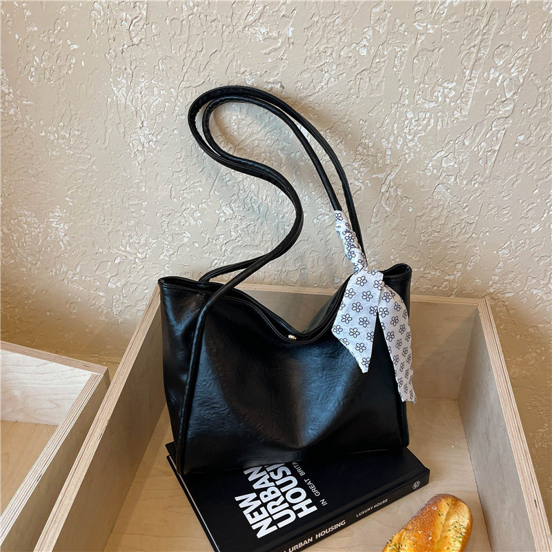 Stilvolle Handtasche mit Schleifenakzent