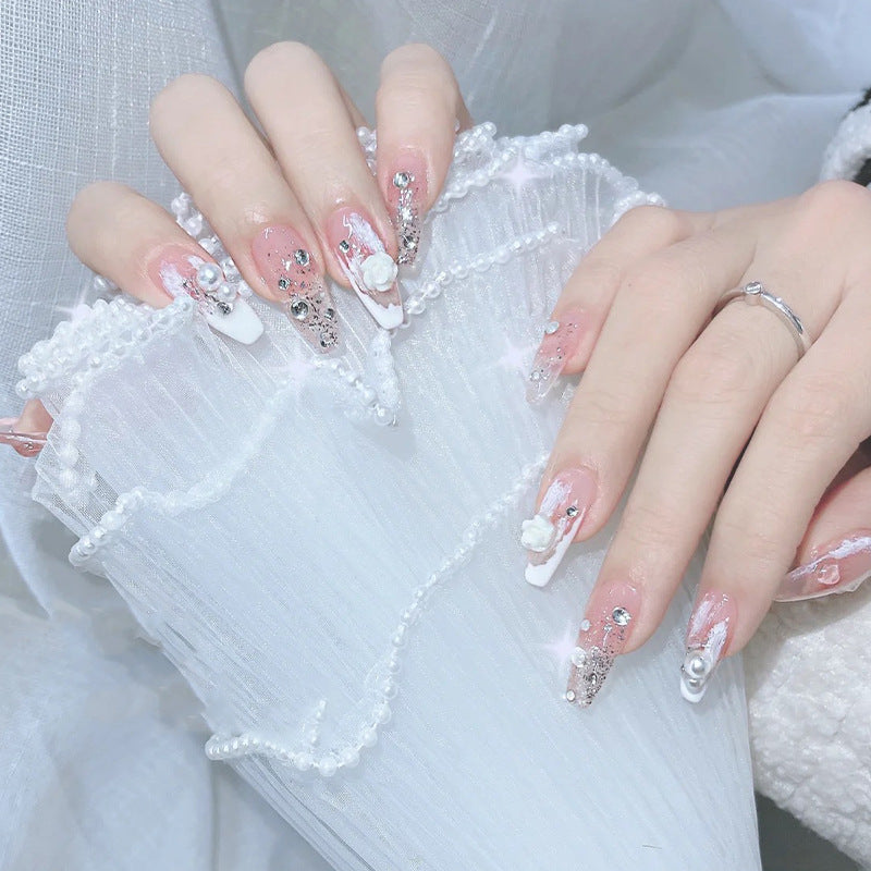 Kunstnagelset mit eleganten 3D-Blüten- und Glitzerverzierungen Brehn