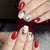 Kunstnagelset mit festlichem Weihnachtsdesign und verspielt festlicher Dekoration Brehn