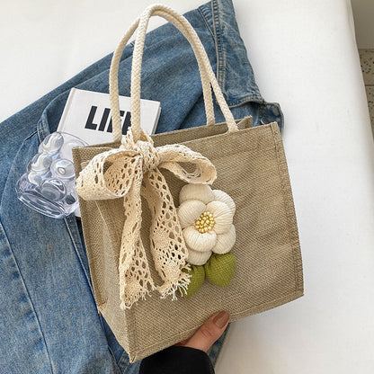 Blumenverzierte Tasche