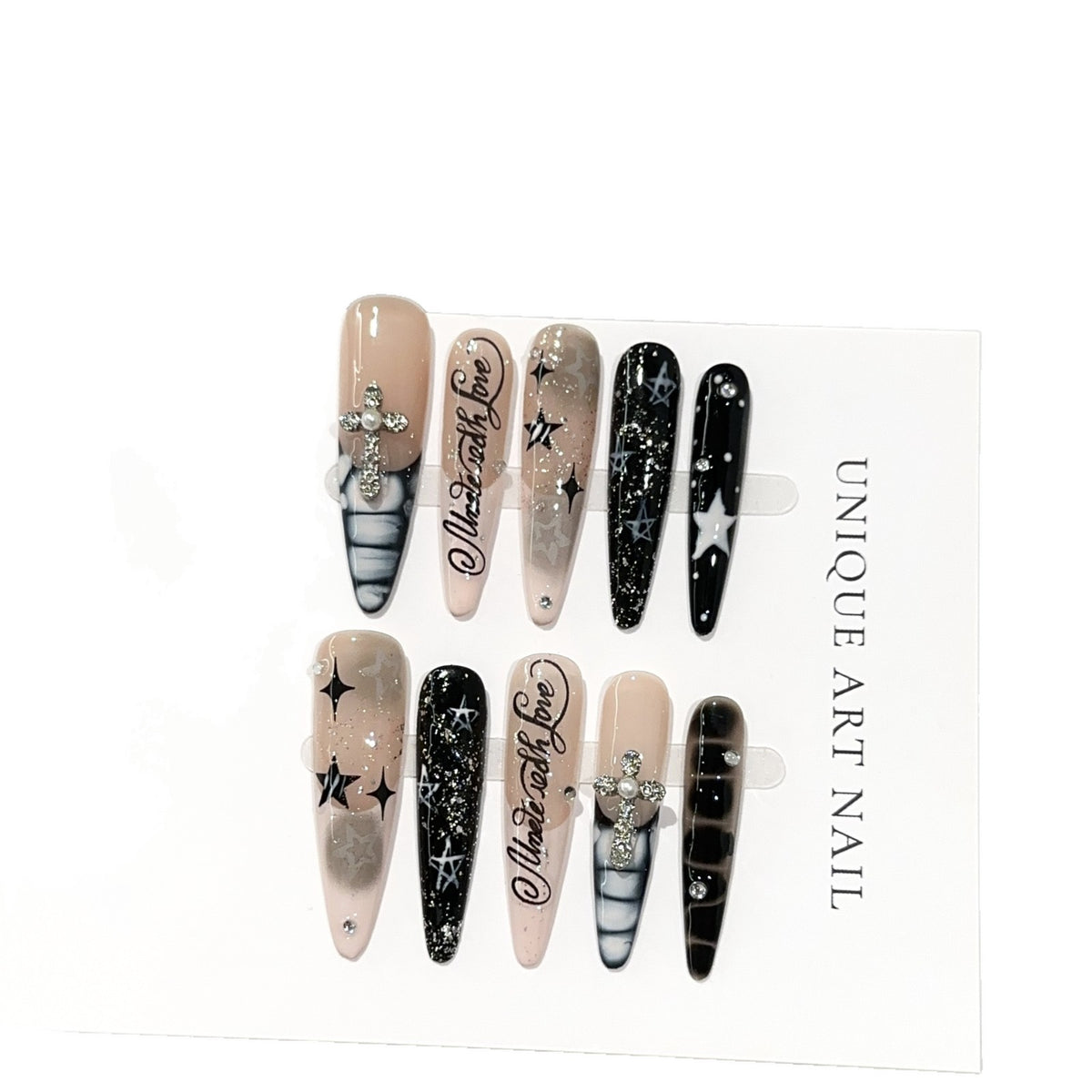 Künstlerische Stiletto Press-On Nagelset mit dekorativen Akzenten