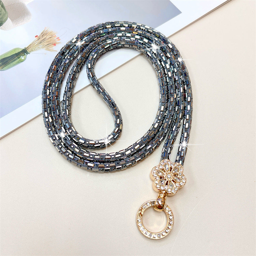 Dekorativer, mit Kristallperlen verzierter Brillenband Brehn