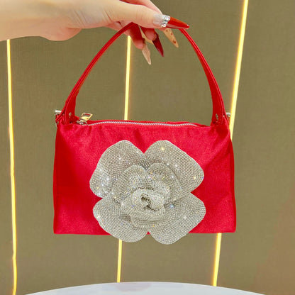 Blumenverzierter Handtasche
