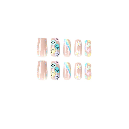 Kunstvolle Nagelkunst mit Blumen- und Smiley-Motiven Brehn