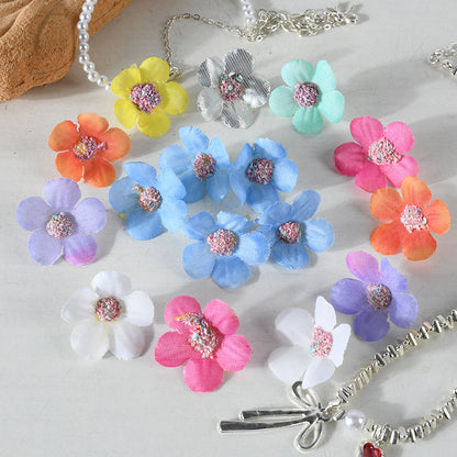 Glitzernde Blumen-Haaraccessoires