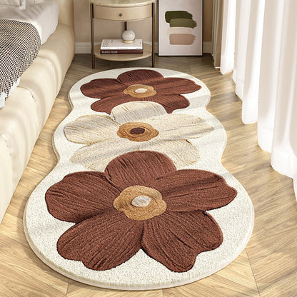 Süßer blumenförmiger Teppich
