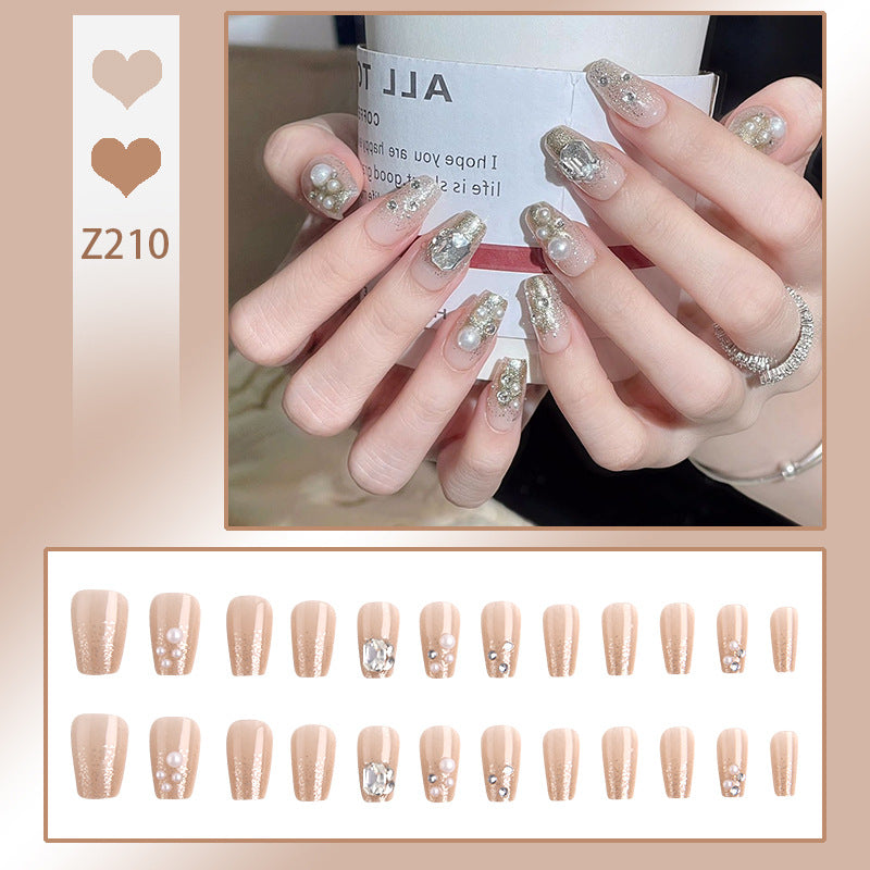 Kunstnagelset mit elegantem Perl- und Glitzerdesign Brehn