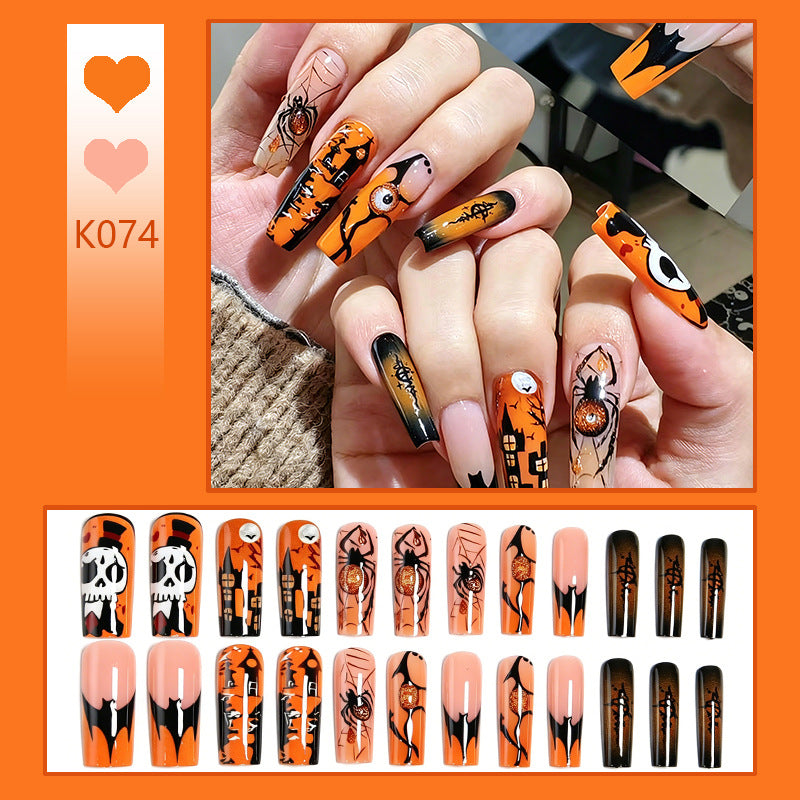 Kunstnagelset mit Halloween-Motiven und kreativem Glitzer Brehn