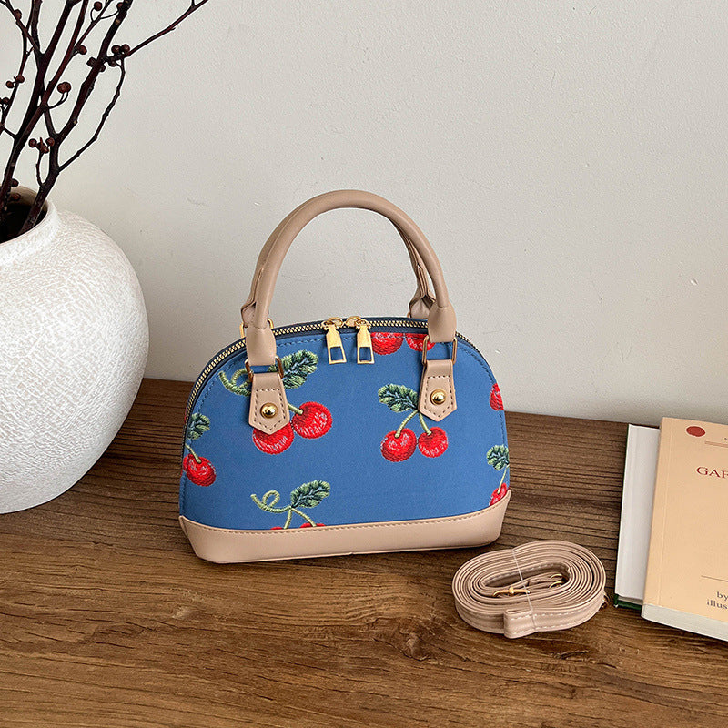 WoBestickte Kirschmuster-Handtasche Brehn