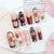 Kreatives Kunstnagelset mit floralen und fruchtigen Akzenten Brehn
