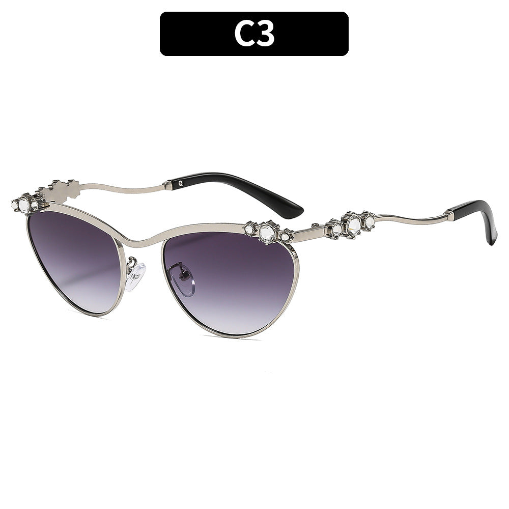Verschnörkelte Katzenaugen-Sonnenbrille