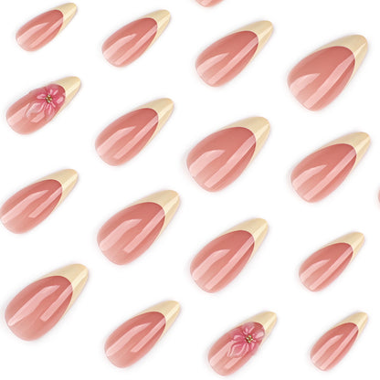 Kunstvolle Stiletto-Nägel mit elegantem Blüten-Akzent Brehn