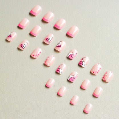 Künstlerisches Nail Art Kit mit Herz- und Funkeldesigns