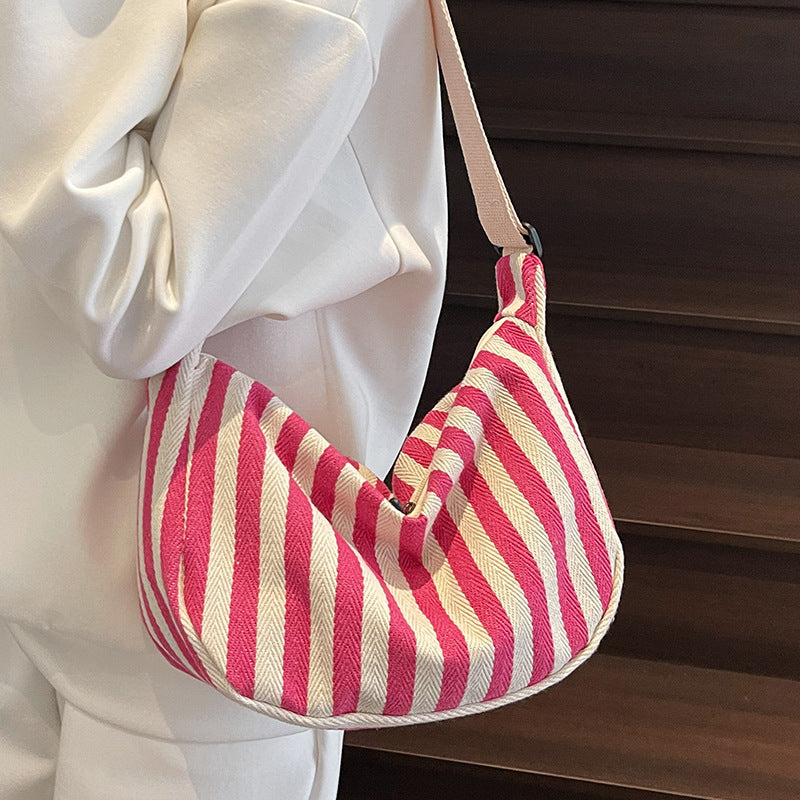 Lässige gestreifte Schultertasche