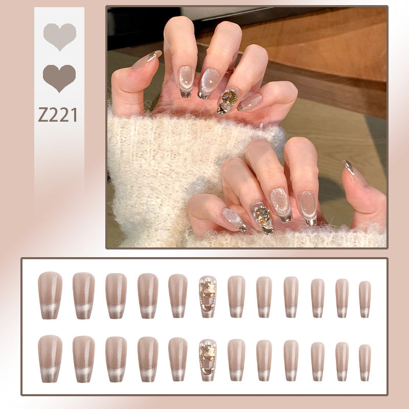 Kunstnagelset mit glamourösen Gold- und Glitzerakzenten Brehn