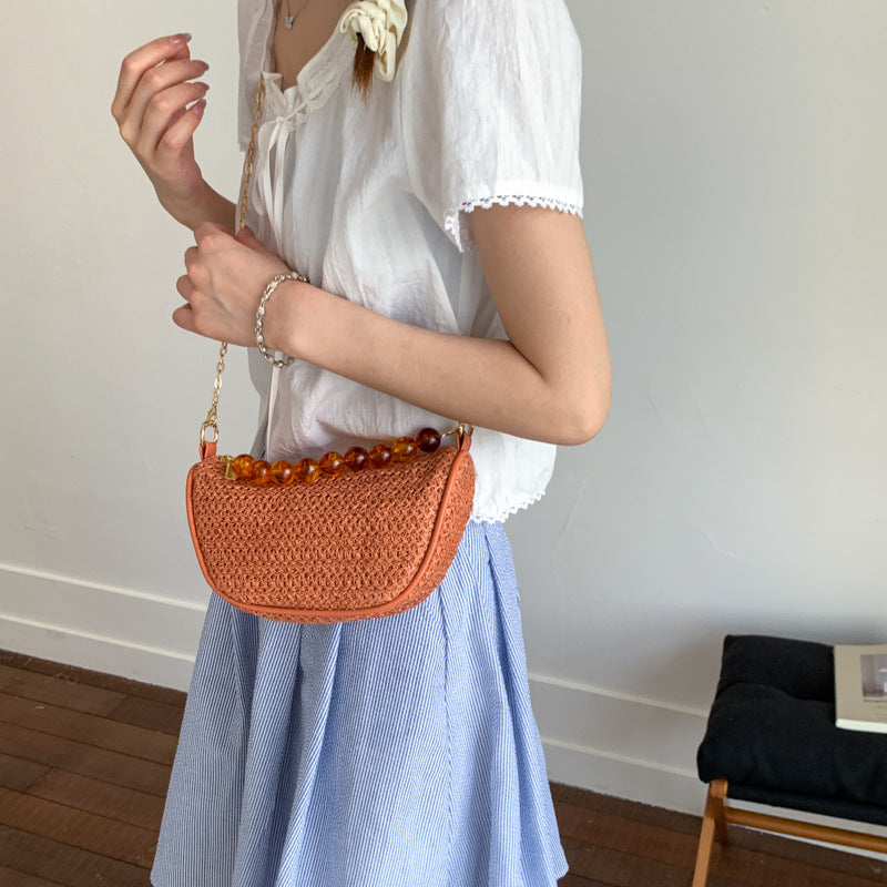 Stylische gewebte Handtasche mit Perlen-Griff Brehn