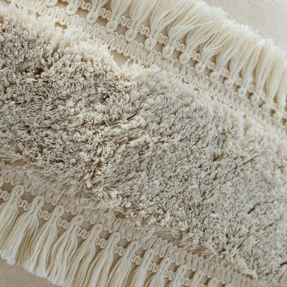 Quadratischer Boho-Kissenbezug mit diagonalem Teddy-Relief, Fransen und Eckquasten Brehn